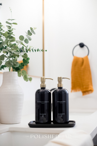 The Polished Jar soap bottle dispensers on tray