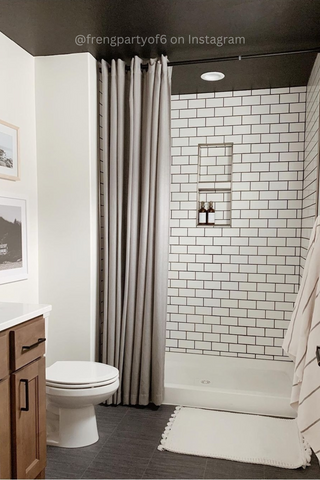 Bathroom shower with bottle soap dispensers