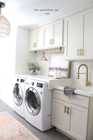 Modern Laundry Room With White Cabinets