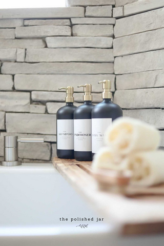 The Polished Jar Plastic Bottle Soap Dispensers on Bath Tub Caddy