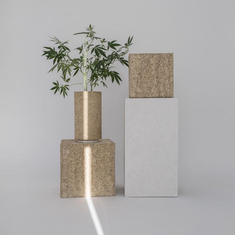 Hempcrete blocks in different shapes with a beam of sunlight 
