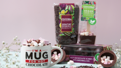 A collection of vegan hot chocolate including flakes, spoons and bombs