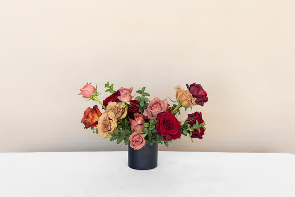 Sahara Flower Arrangement of warm toned roses