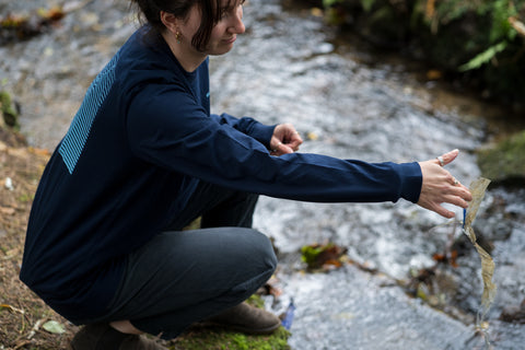 Jas wearing the Dyffryn Save Our Rivers T Shirt picking up litter