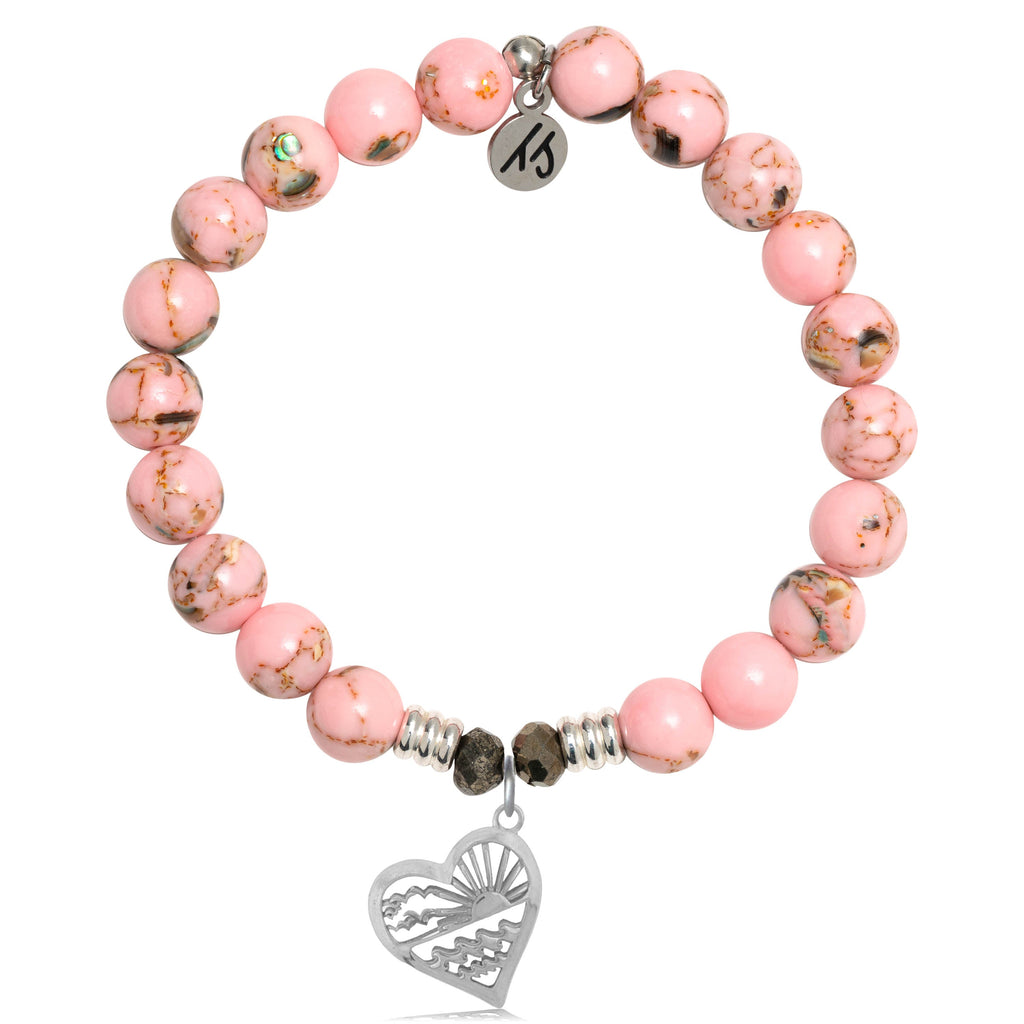 Pink glass beads and a silver charm for bottle bracelet