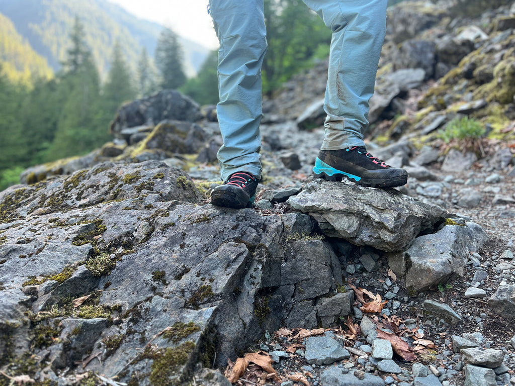 La Sportiva Aequilibrium LT GTX mountain boots posing on rocky terrain on Mount Forgotten trail