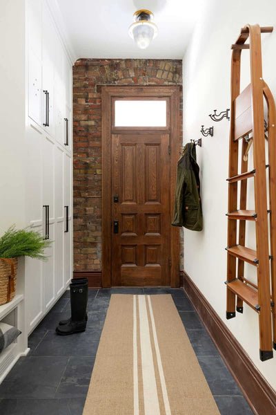 mudroom with slate tile flooring