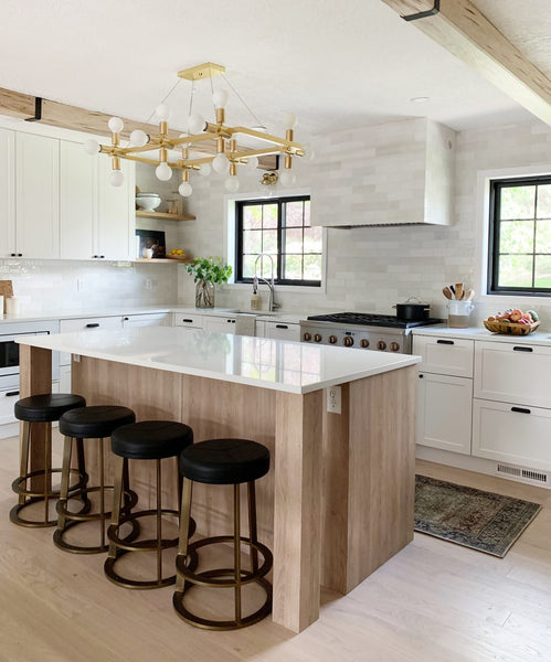 kitchen with subway tile range hood