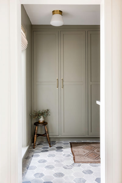 mudroom with hexagon tile