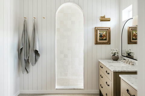bathroom with white handcraft tile