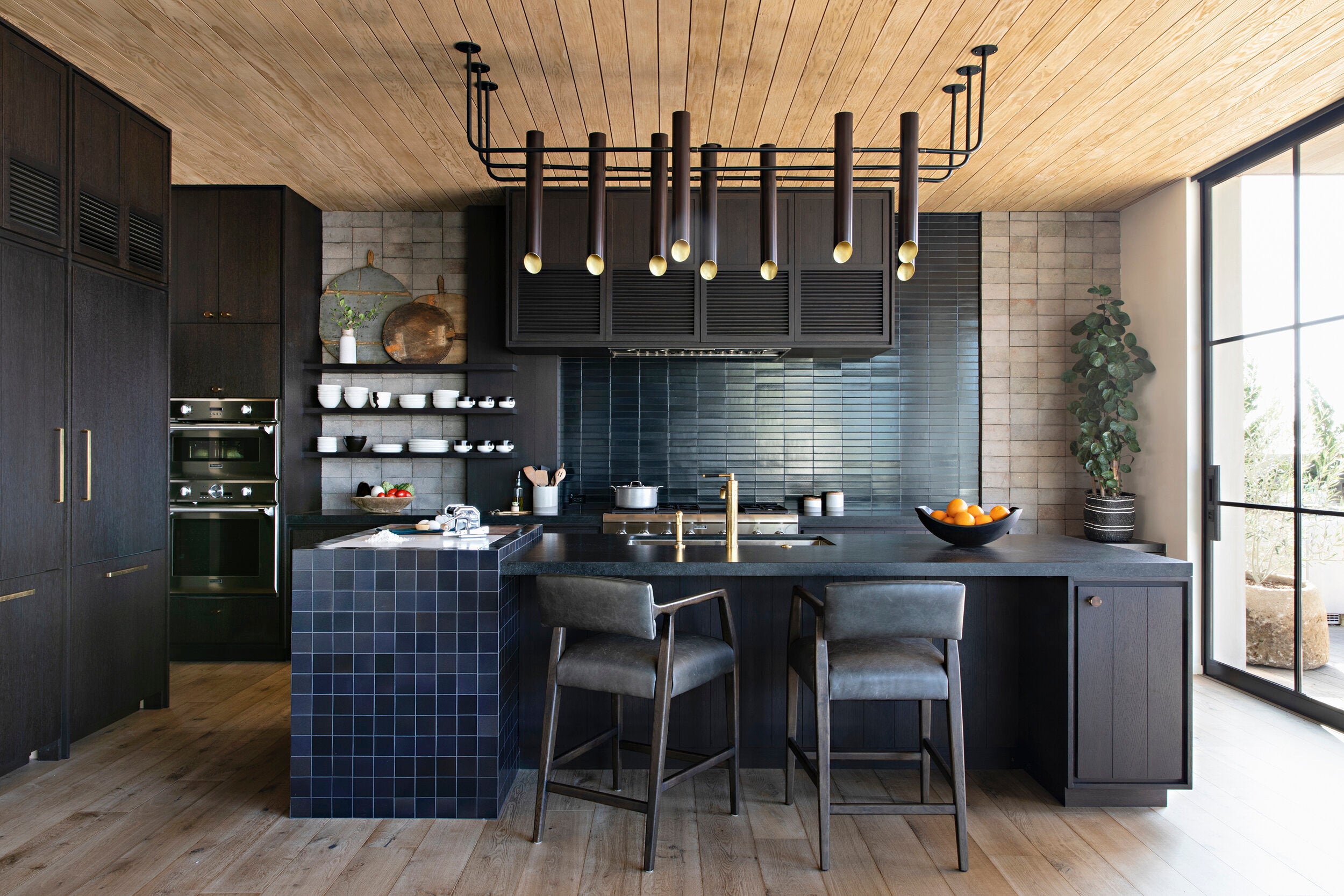kitchen with tile and wood ceiling