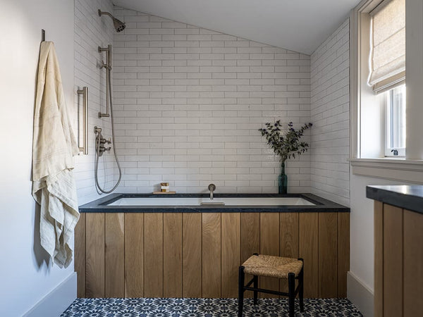 shower with handmade tile and undercount tub