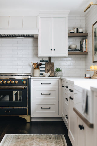white kitchen with white subway tile