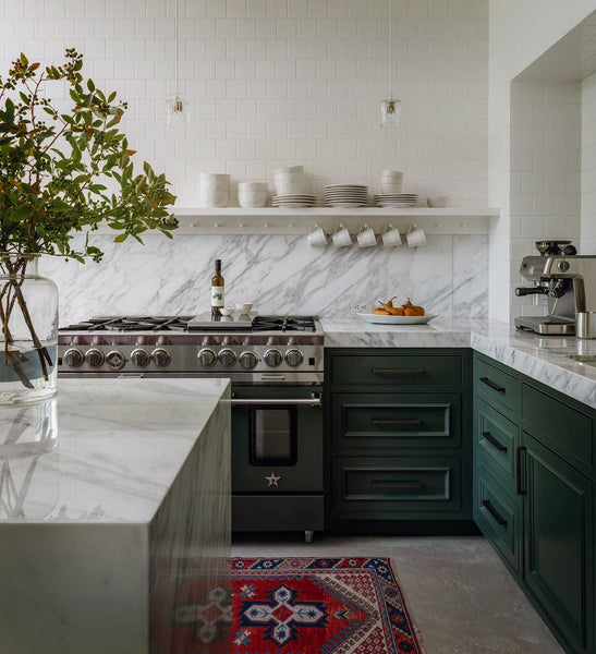 kitchen with slab backsplash and white tile