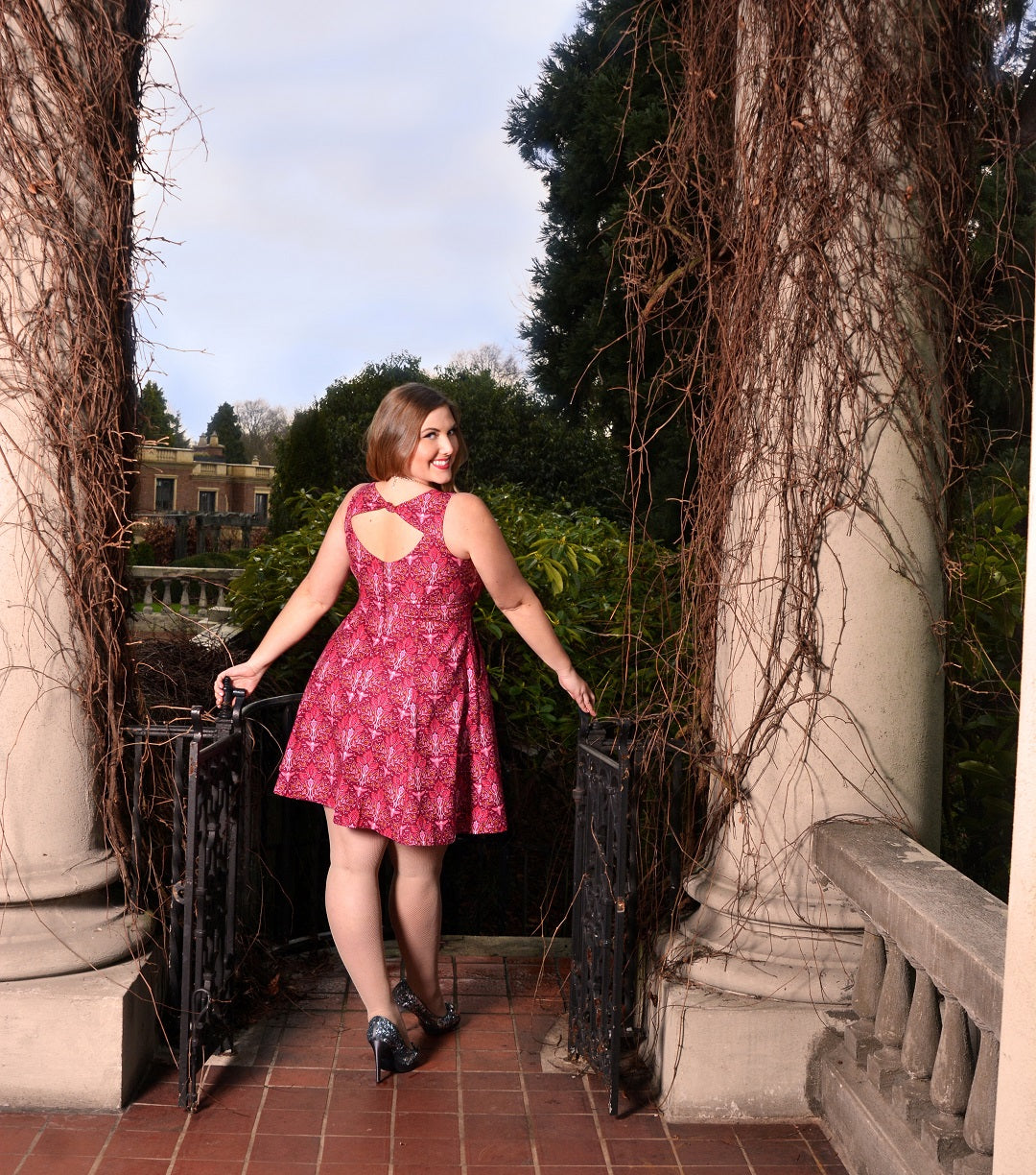 Charlotte Doering models a Cherry Velvet Dress at Hycroft Manor