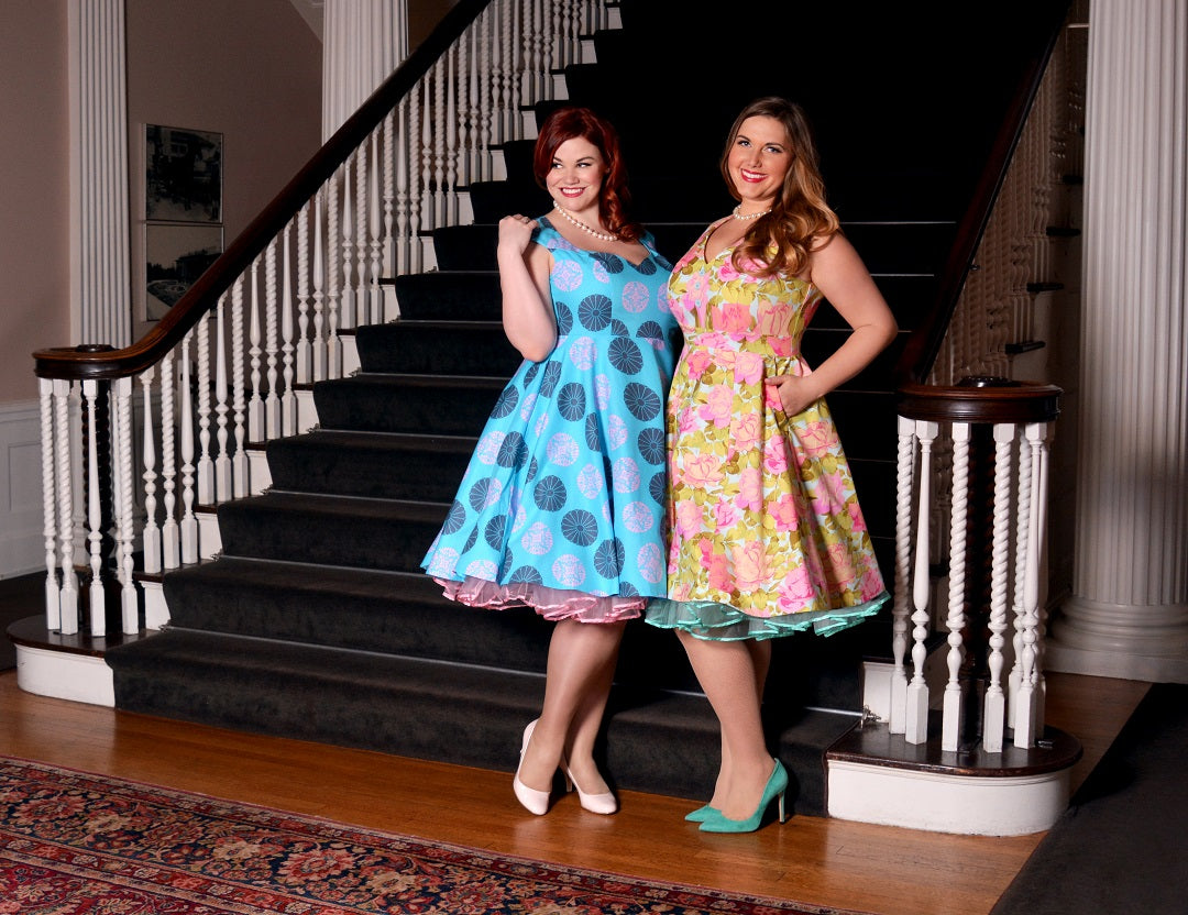 models Ruby Roxx and Charlotte Doering wearing Cherry Velvet dresses at Hycroft Manor