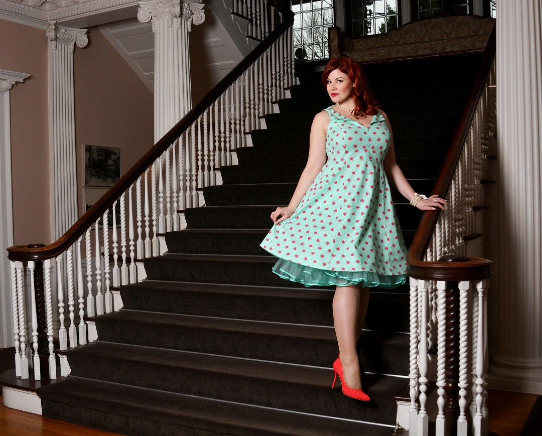Model Ruby Roxx wearing a Cherry Velvet dress at Hycroft Manor