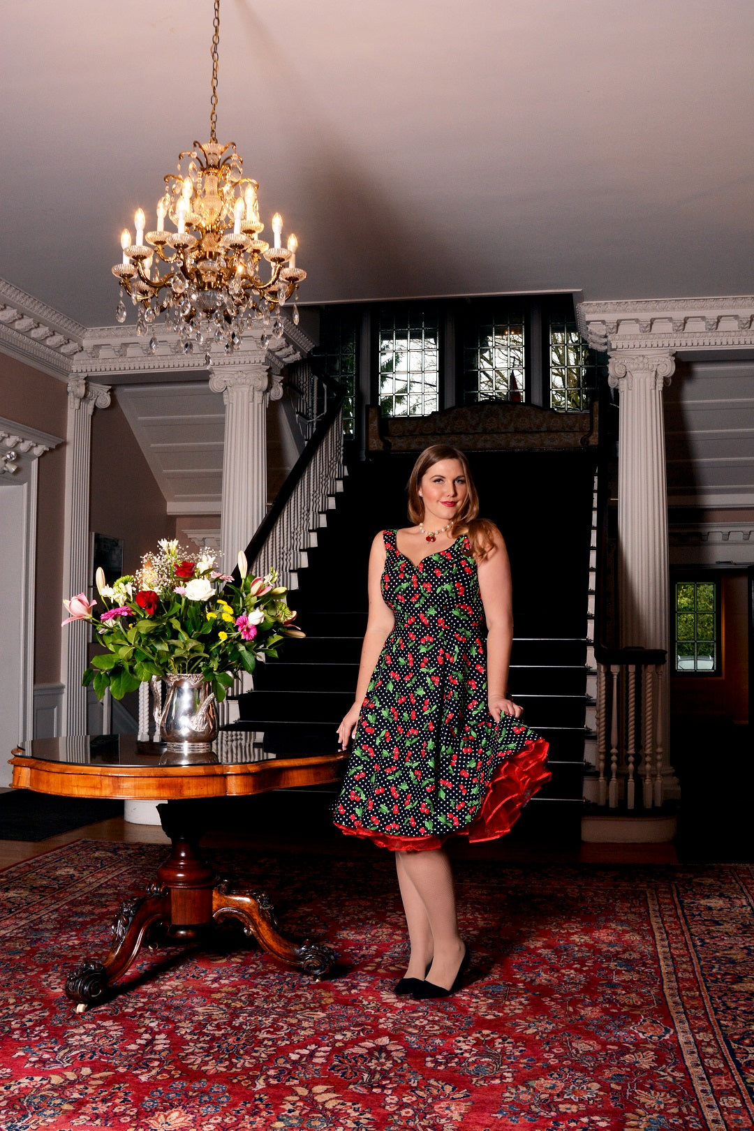 Model Charlotte Doering wearing a Cherry Velvet dress at Hycroft Manor