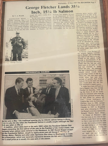 a photo of a 1987 newspaper article about George Fletcher's 35 inch Atlantic Salmon that he brought to President Ronald Reagan