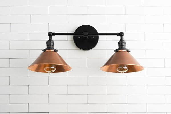 Copper shade industrial sconce with Edison bulb