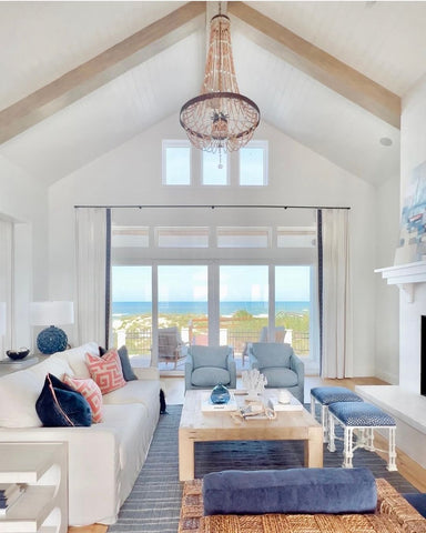 Whitewashed ceiling with wood beams in coastal home