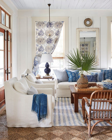 Blue and white fabric accents in coastal theme