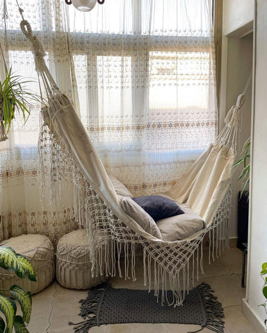 Cozy hammock in a coastal reading nook