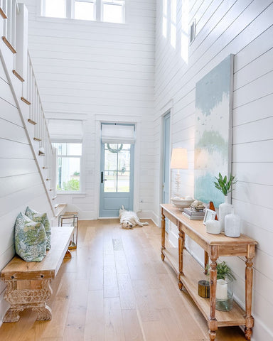 Aqua shiplap walls in coastal living room