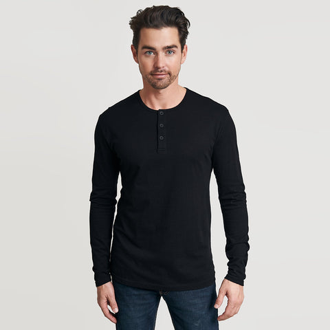 Man wearing a True Classic Black Long Sleeve Henley