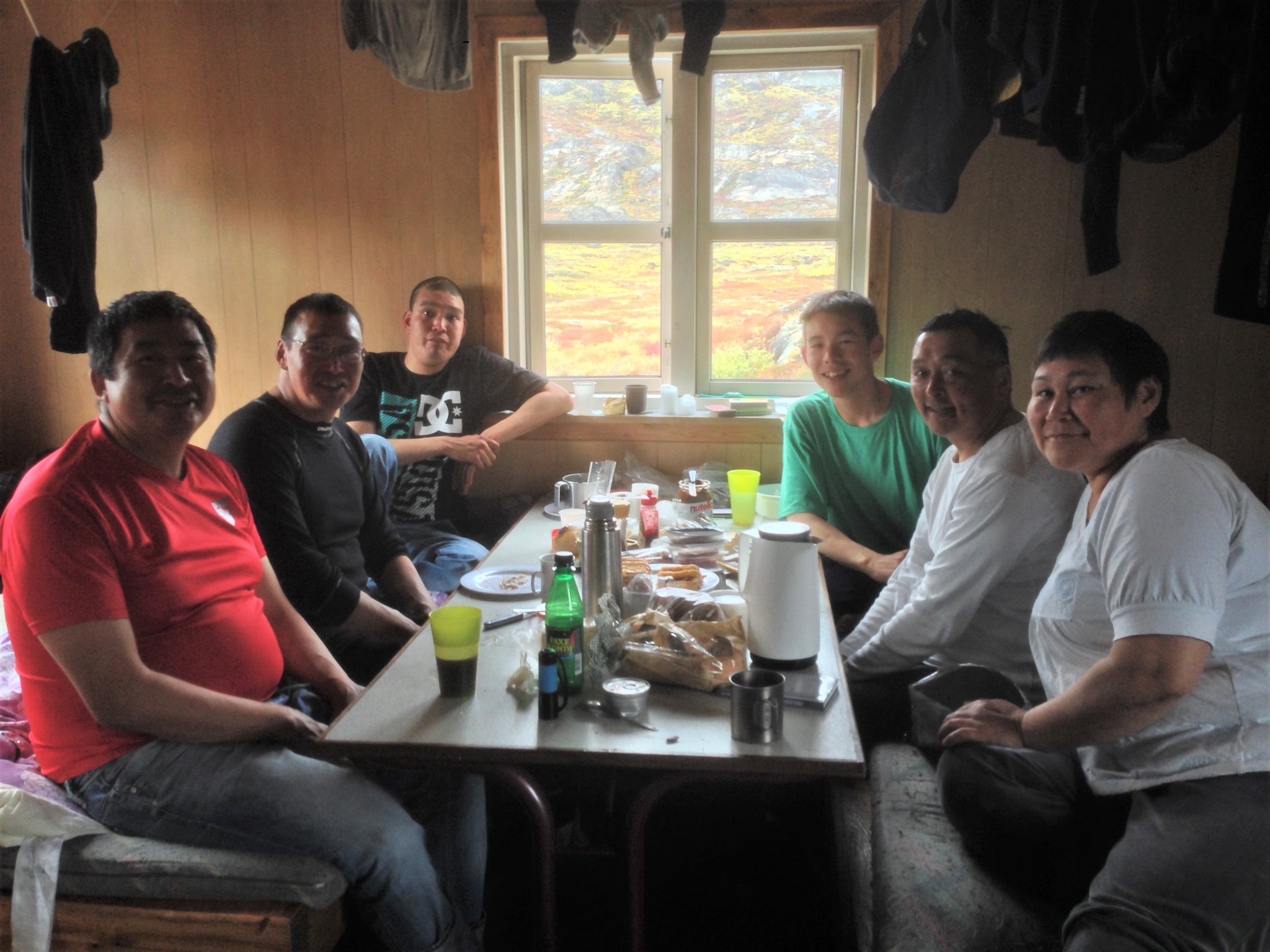 Inuit extended family at Eqalugaarniarfik Hut, Greenland (Arctic Circle Trail)