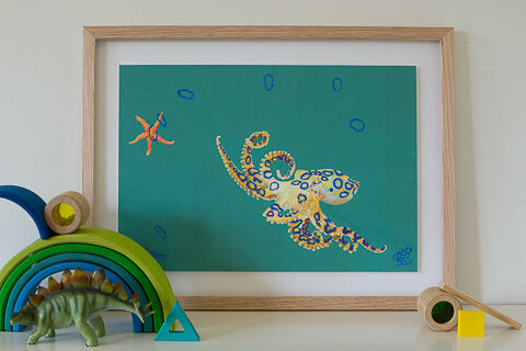 Octopus artwork by Good Art Australia. Painting framed and sitting on a shelf with kids toys.