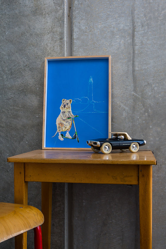 Artwork on children's vintage desk with vintage style car, featuring Rottnest Island Quokka print, Bakery Run. 