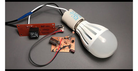 An LED bulb with a relay and circuit connected.