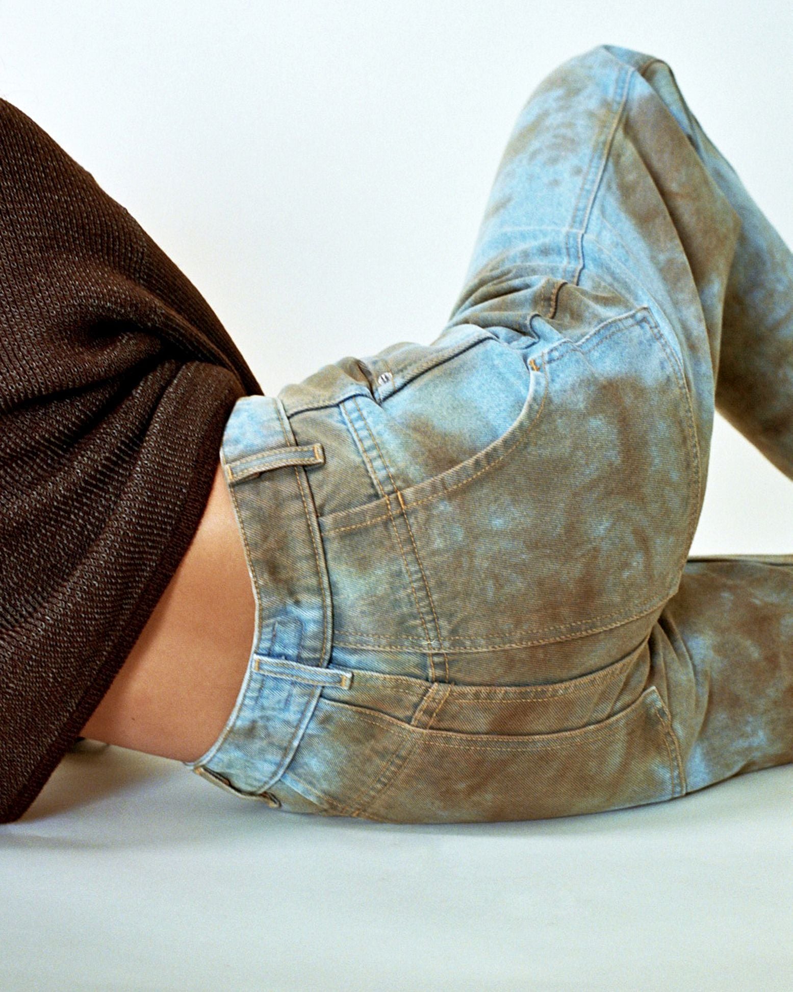 back detail photo of tie dye jeans from eckhaus latta 