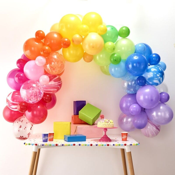 spiral rainbow balloon arch