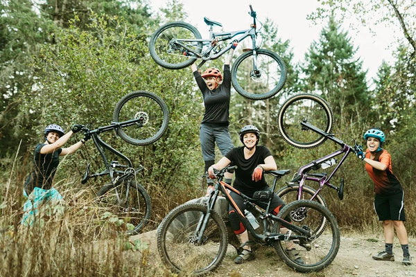 A group of happy women mountain bikers