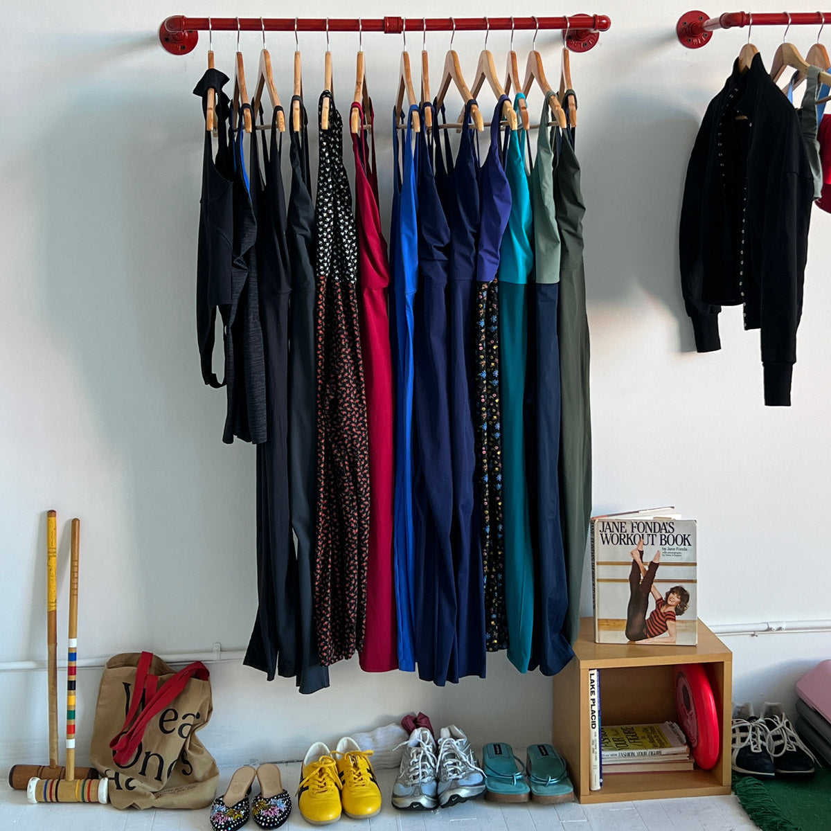 Image of WOA Studio in New York City of clothes on a rolling rack