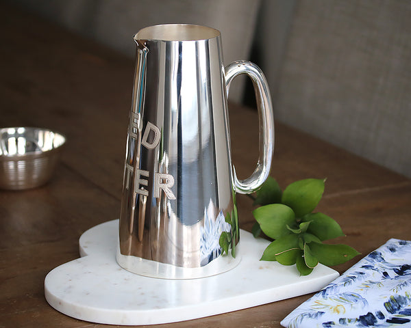 https://cdn.shopify.com/s/files/1/0221/4876/products/hotel.iced.water.pitcher_600x480.jpg?v=1613569041