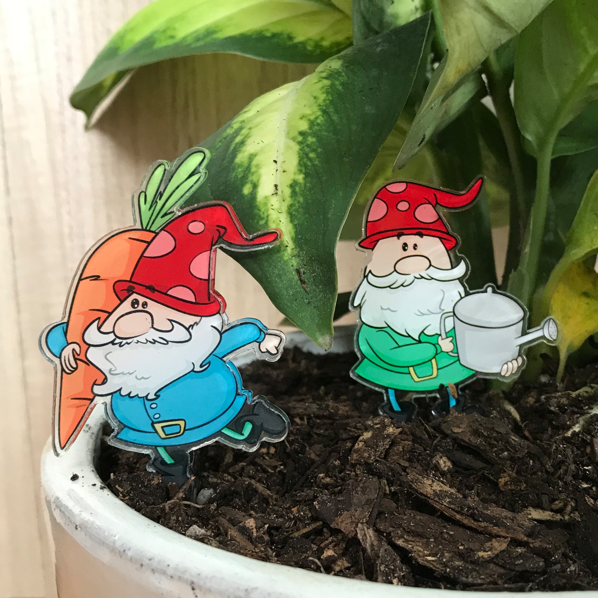 https://cdn.shopify.com/s/files/1/0221/5178/products/HouseplantGnomes_GardeningGang_1_2000x.jpg?v=1614877566