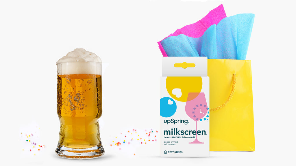 Milkscreen in gift bag next to glass of beer