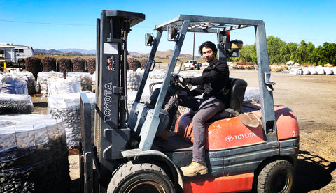 Transporting decorative stones with a forklift