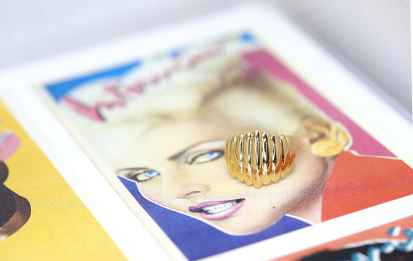 vemreil gold pigalle edgy bena jewelry ring made in montreal on a multi color background