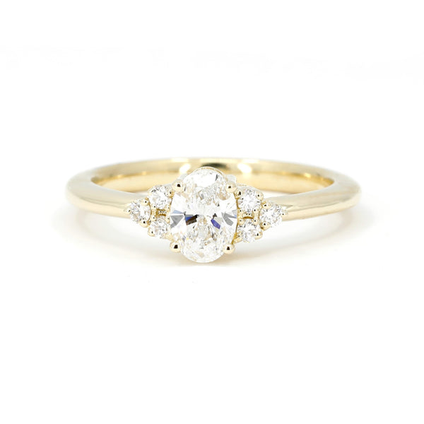 oval shape lab grown diamond engagement ring by bena jewelry montreal on white background