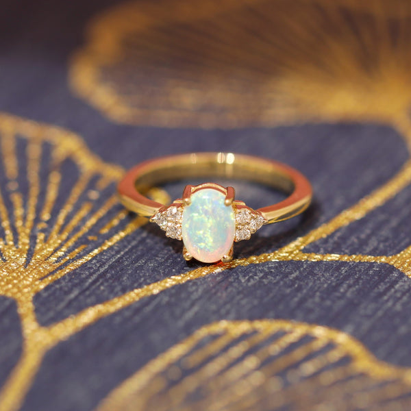 oval shape opal and diamond desir ring custom made by bena jewelry