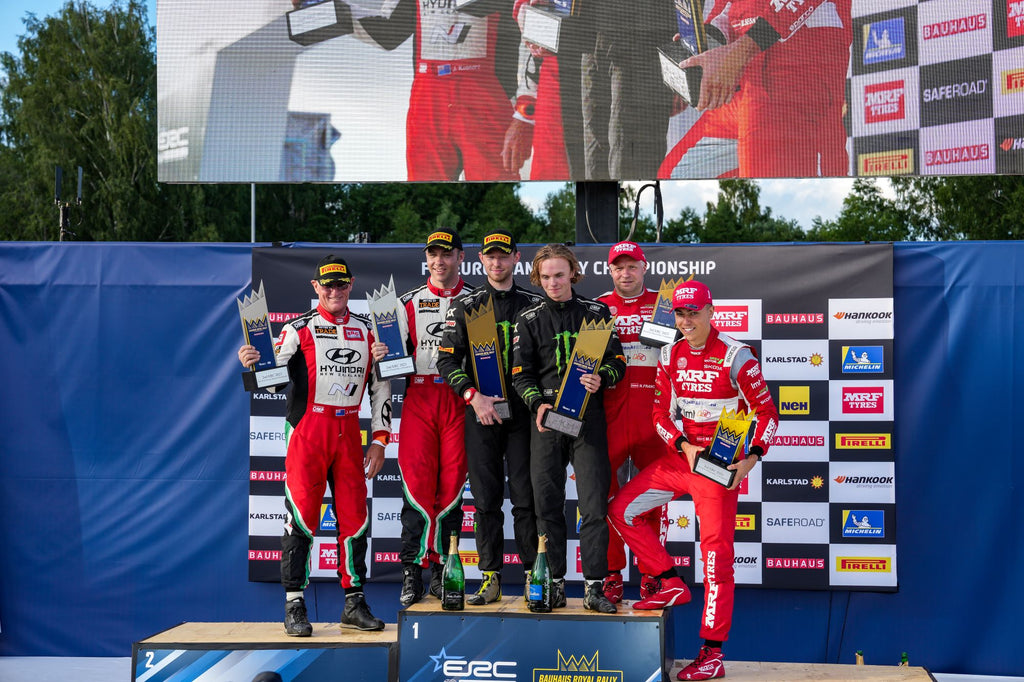 Hayden Paddon and John Kennard on the podium in Sweden #2 place