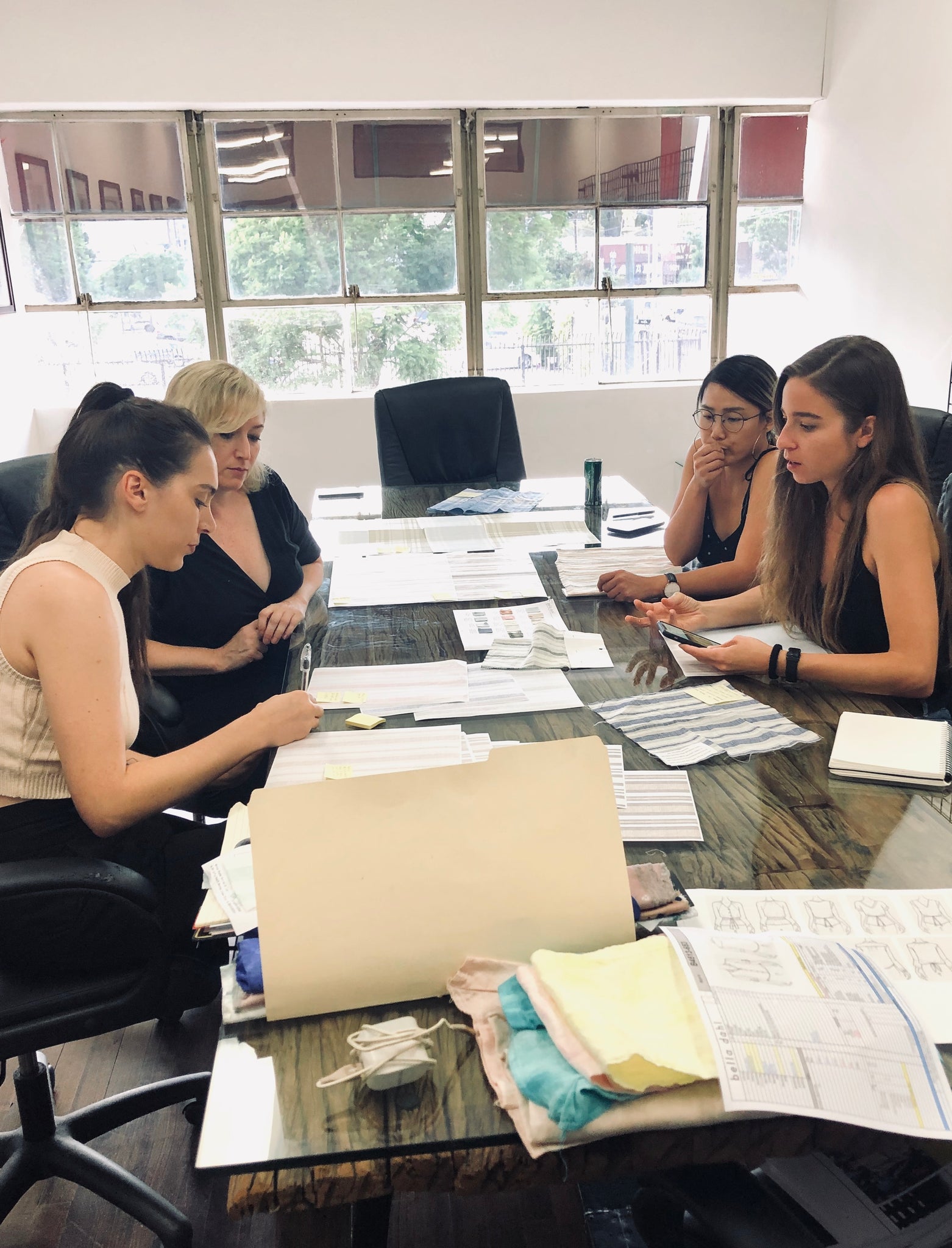 Lynn, Heather, Chelsea and Su at discussing Summer 20 textiles.