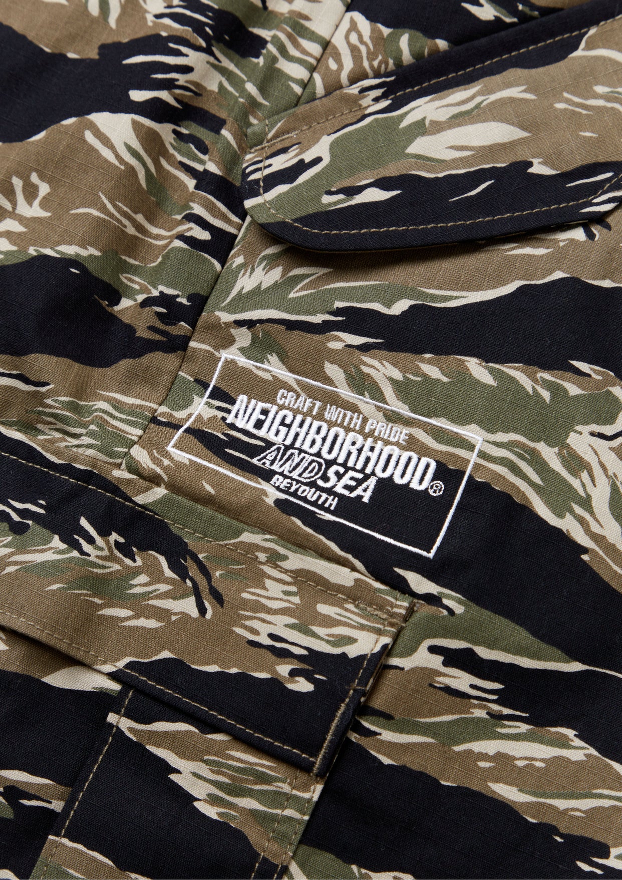 NH X WIND AND SEA . CAMOUFLAGE CARGO PANTS