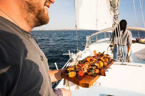 Chef Tim Hollingsworth sailing and cooking Seatopia Collars