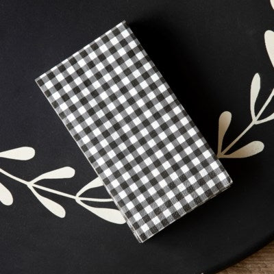 black and white paper plates and napkins