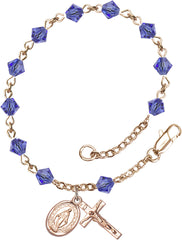 Learn More about 14 Karat Gold Filled 5mm Sapphire Swarovski Rundell-Shaped Rosary Bracelet Image of 14 Karat Gold Filled 5mm Sapphire Swarovski Rundell-Shaped Rosary Bracelet